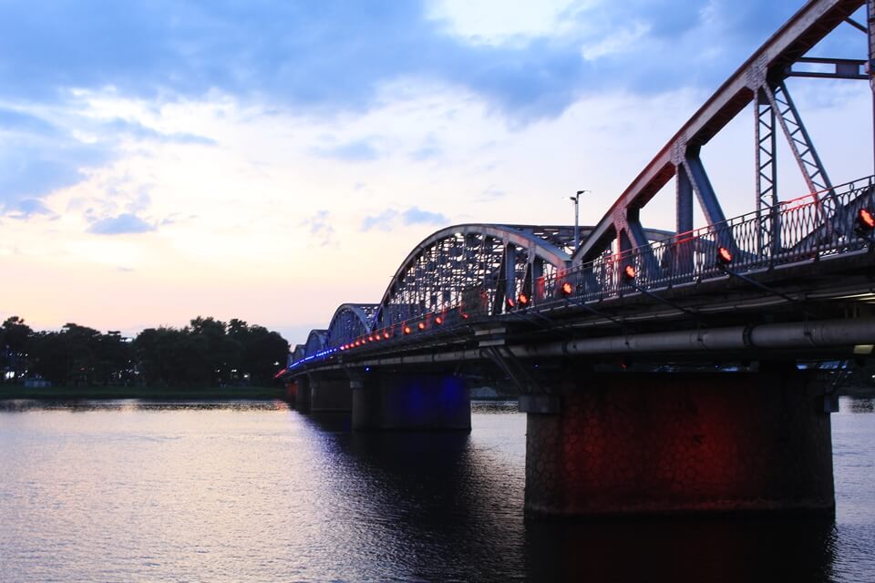 Romantic sunset on the Perfume River and Trang Tien