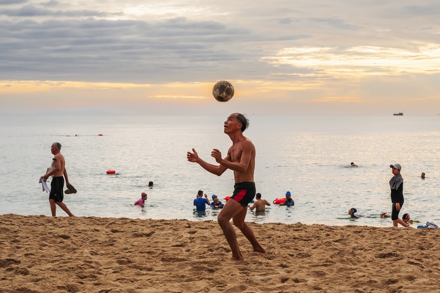 Playing football in the early morning in Nha Trang