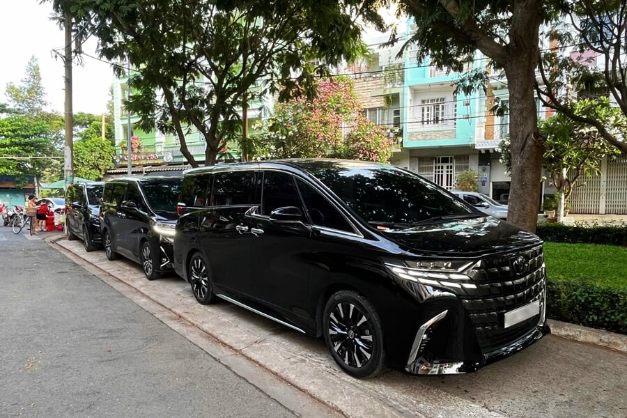 Toyota Alphard MPVs parked and ready for rental use