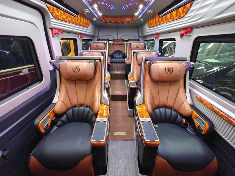 Interior of Dcar Luxury Van with leather seats and ambient lighting