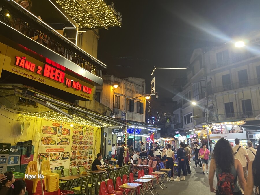 Busy street in Hanoi with people walking, not for driving a car in this area