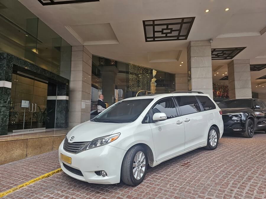 Private car waiting for guests at a hotel in Hanoi for pickup