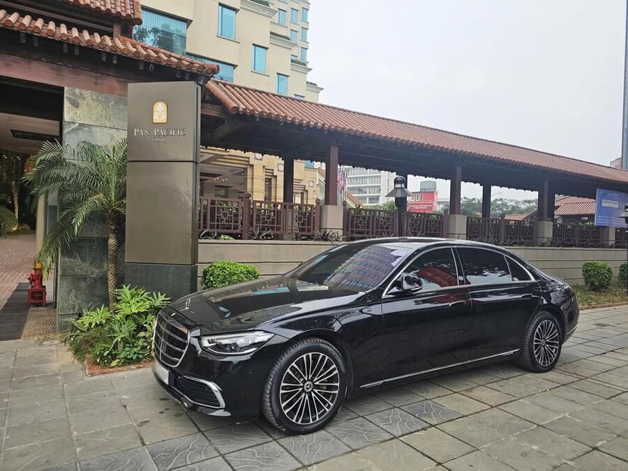 Private car waiting at a hotel in Hanoi for transfer to Ha Long Bay