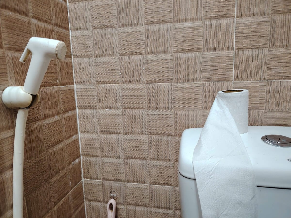 Toilet paper and jet spray in a bathroom in Vietnam