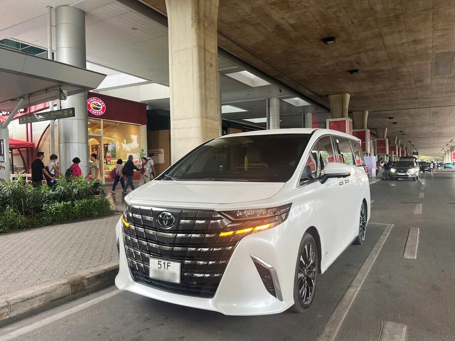Luxury Toyota Alphard waiting at the airport terminal to pick up VIP guests in Vietnam