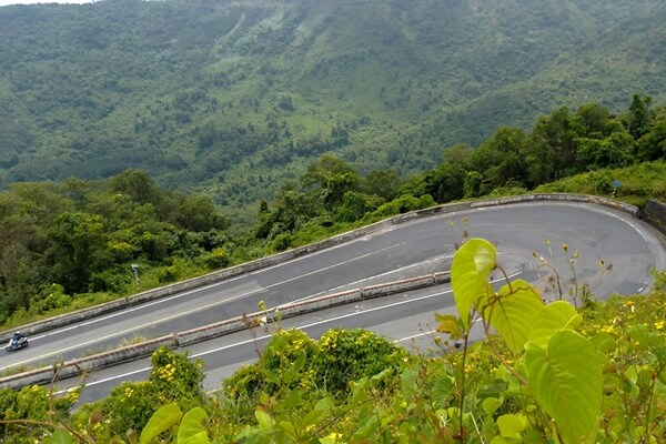 Scenic coastal road on Hai Van Pass, ideal for car journeys in Central Vietnam