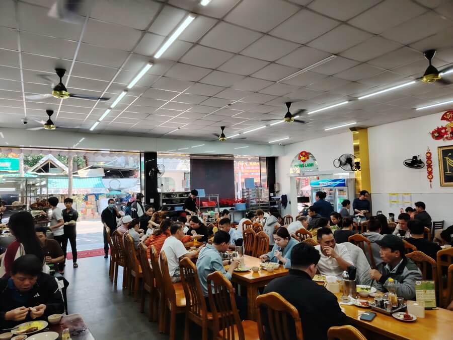 Customers dining at Nhung Chicken Rice Restaurant in Quang Ngai