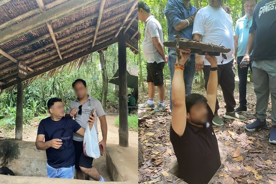 Visitors exploring tunnel entrances and underground sections of the Cu Chi Tunnels