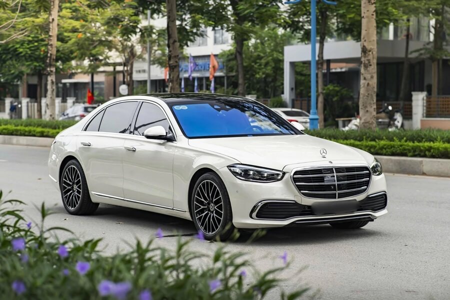 Elegant white Mercedes-Benz S-Class sedan