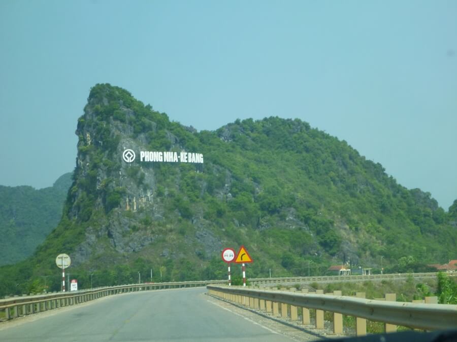 View from a private car approaching the Phong Nha–Ke Bang entrance sign