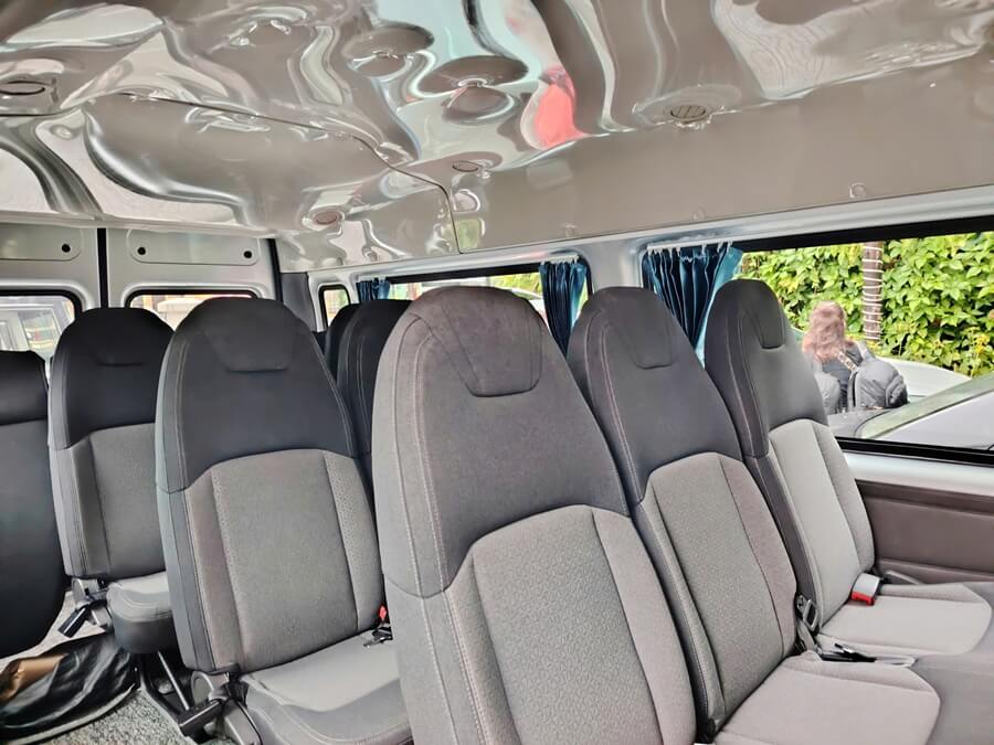 16-seat van interior for private transfer from Ho Chi Minh City to Chau Doc