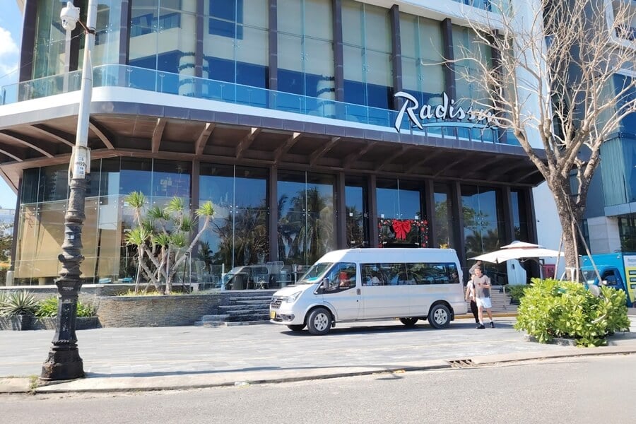 Private transfer vehicle picks up guests at a hotel in Da Nang before departing for Quy Nhon.