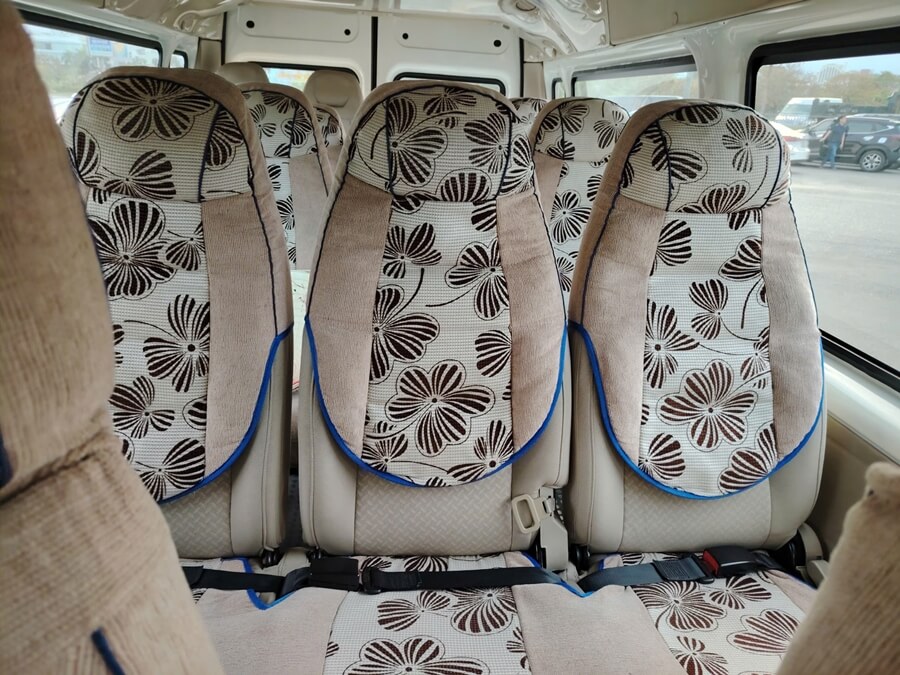 Interior of a 16-seat van for private transfers from Ho Chi Minh City to Tay Ninh