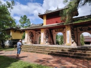 Guest visits Tam Quan Gate at Thien Mu Pagoda in Hue City
